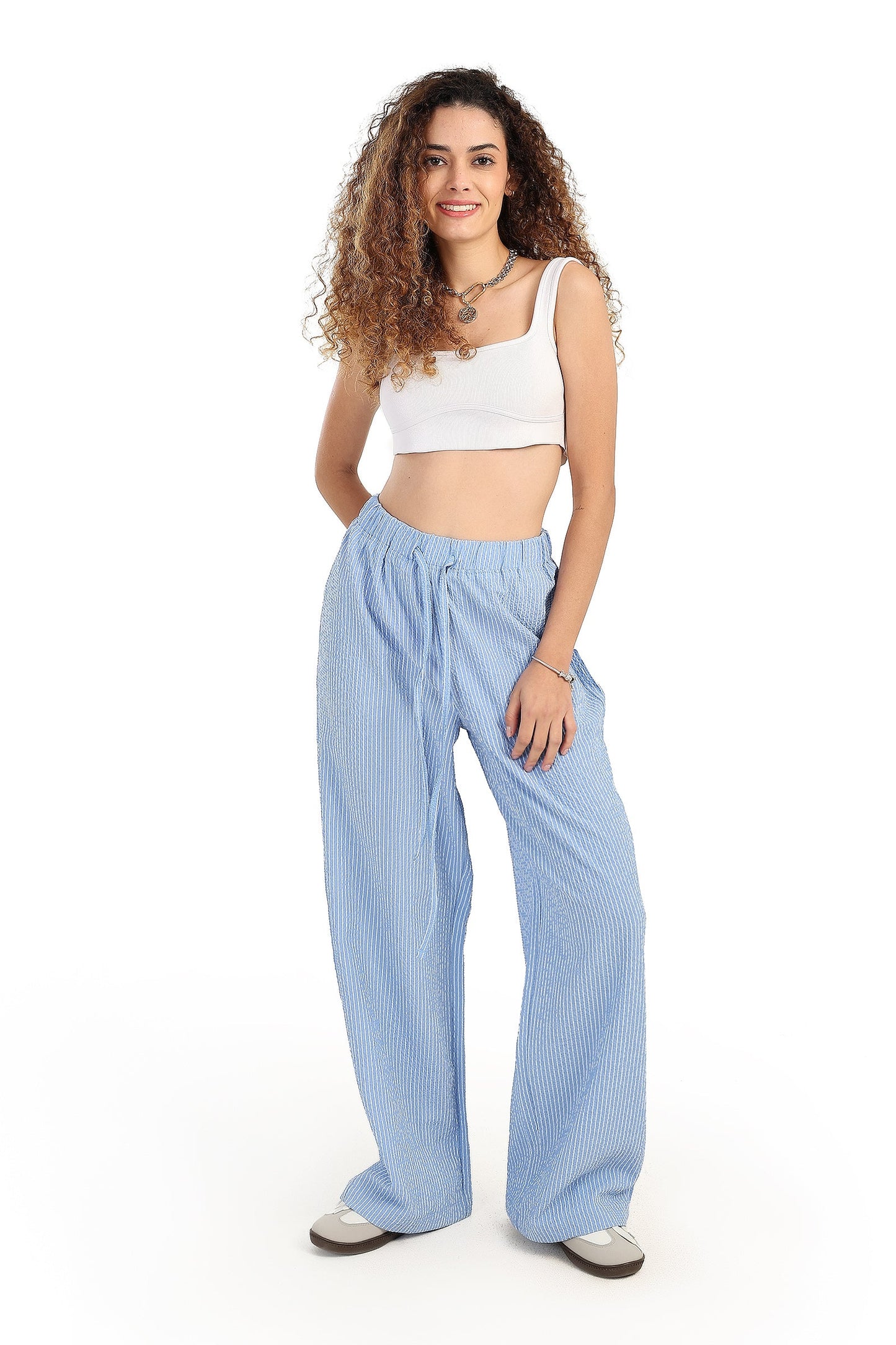 بنطال مخطط واسع الساق