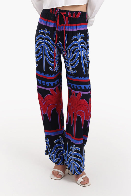 بنطال بطبعة نخيل ملونة