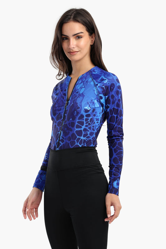 بدلة سباحة واقية من الطفح الجلدي باللون الأزرق المحيطي