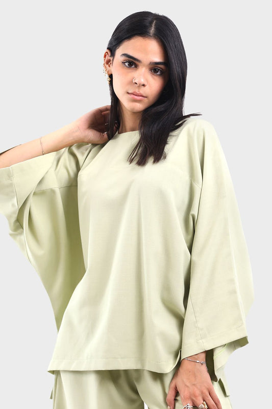 طقم مكون من قطعتين بلوزة ذات أكمام واسعة وبنطلون، أخضر باهت