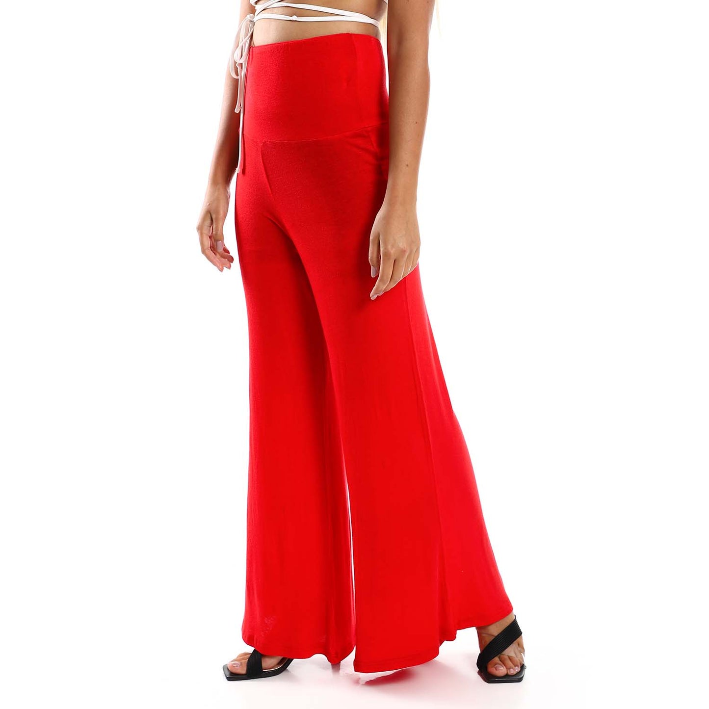 Solid Pattern Flare Fit Pants - بنطلون واسع بنمط سادة