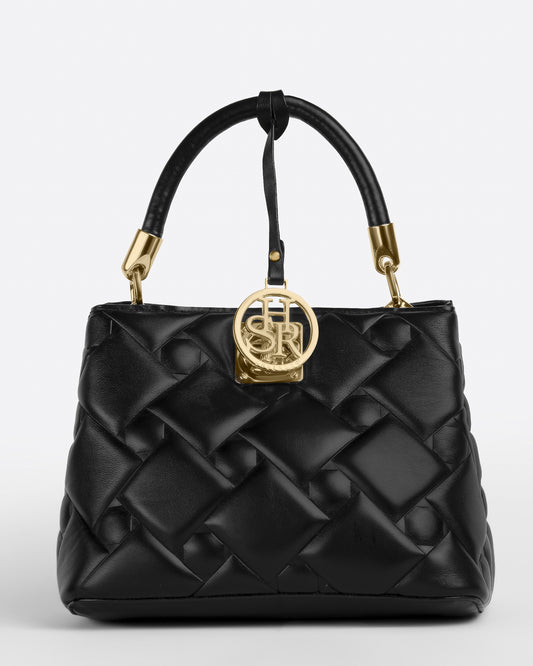 حقيبة يد جلدية منقوشة