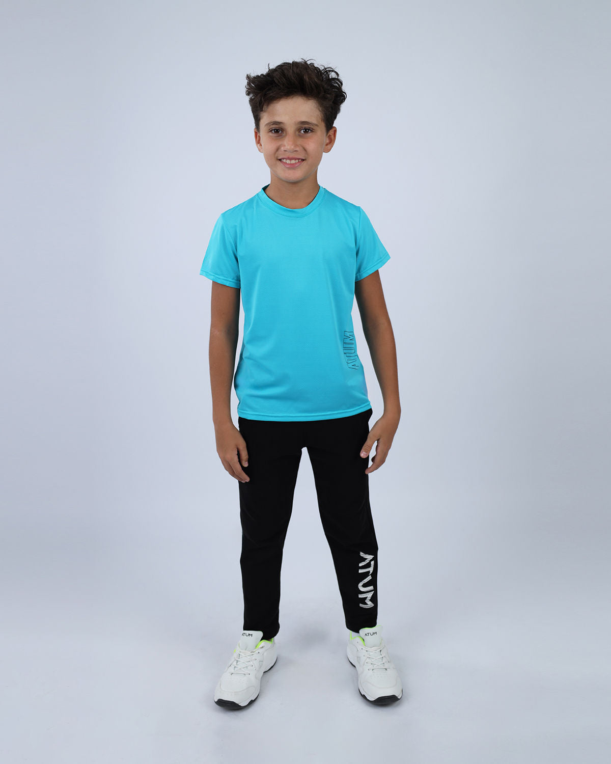 تي شيرت رياضي للتدريب السريع باللون الفيروزي للأولاد