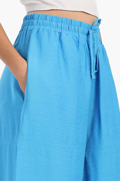 بنطلون كتان واسع الساق