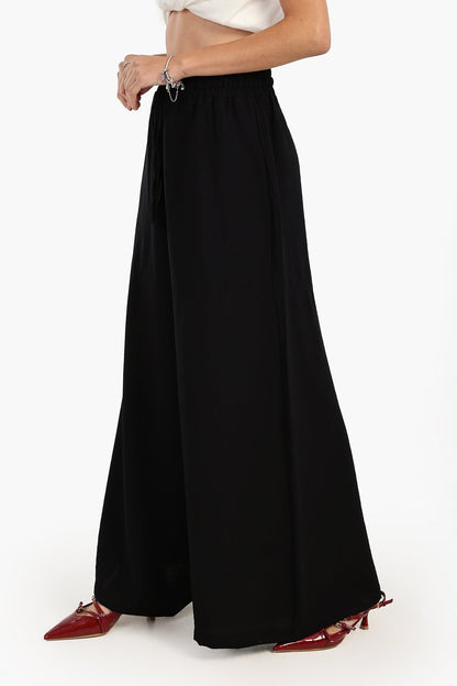 بنطلون كتان واسع الساق