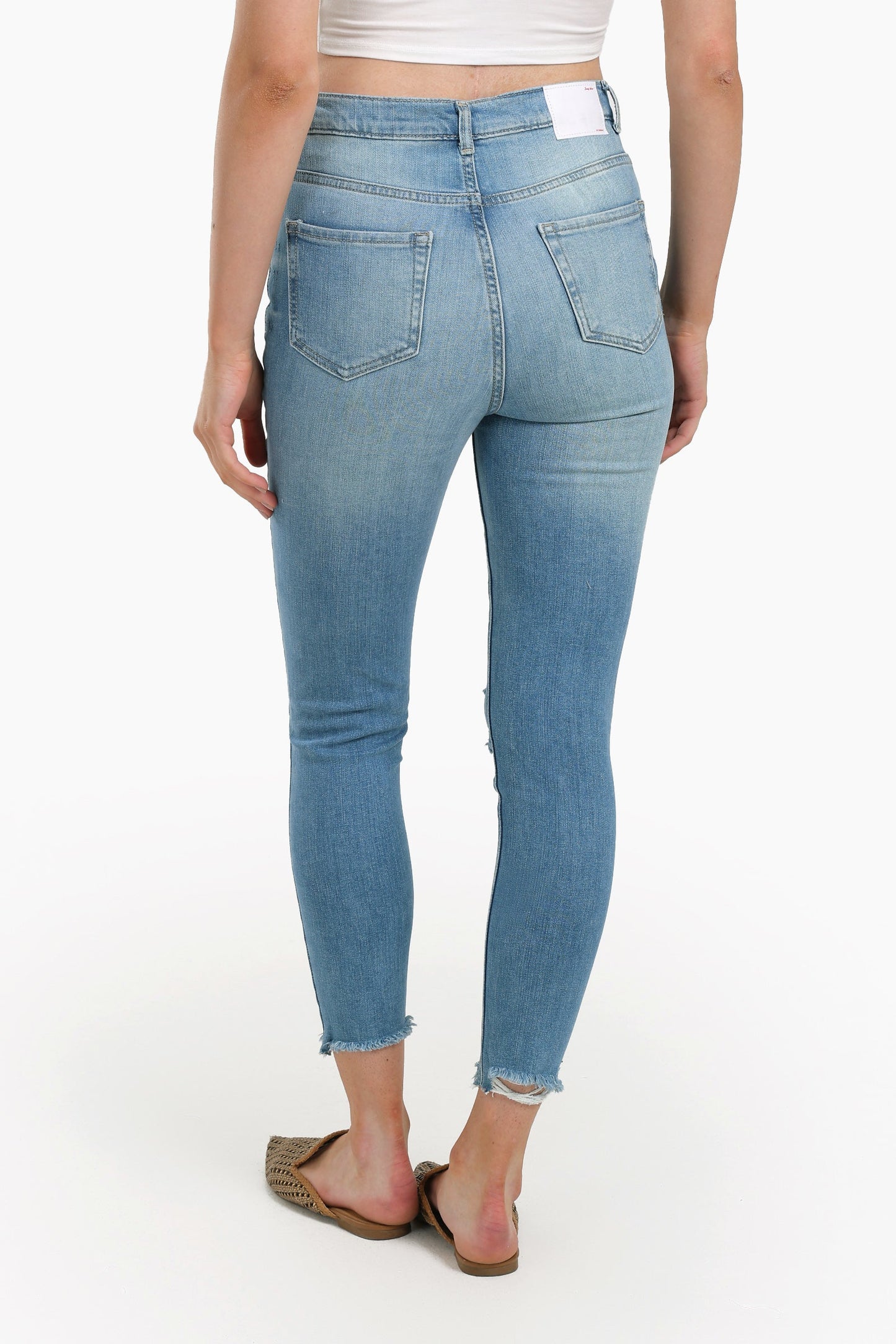 بنطال جينز ضيق بطول الكاحل