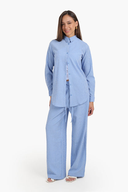 قميص مخطط بأكمام طويلة