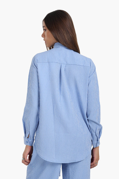 قميص مخطط بأكمام طويلة