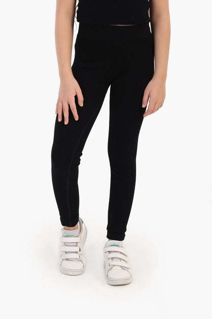 بنطال ضيق مضلع للبنات