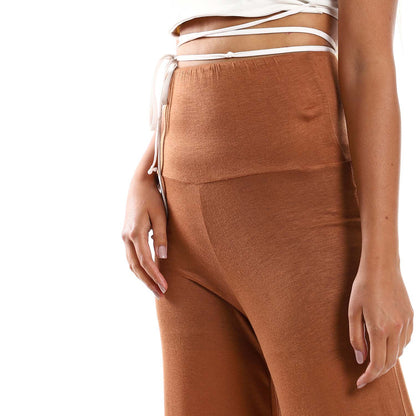 Solid Pattern Flare Fit Pants - بنطلون واسع بنمط سادة