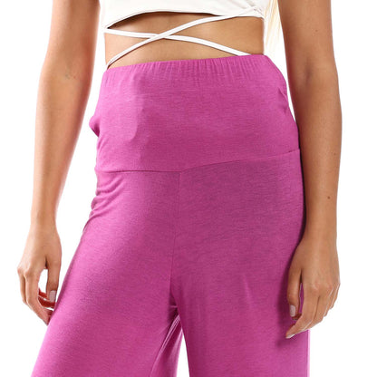 Solid Pattern Flare Fit Pants - بنطلون واسع بنمط سادة