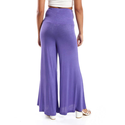 Solid Pattern Flare Fit Pants - بنطلون واسع بنمط سادة