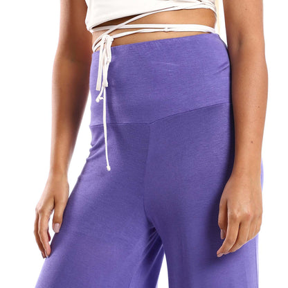 Solid Pattern Flare Fit Pants - بنطلون واسع بنمط سادة