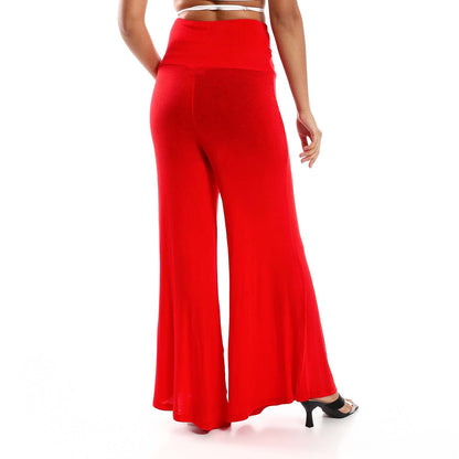 Solid Pattern Flare Fit Pants - بنطلون واسع بنمط سادة