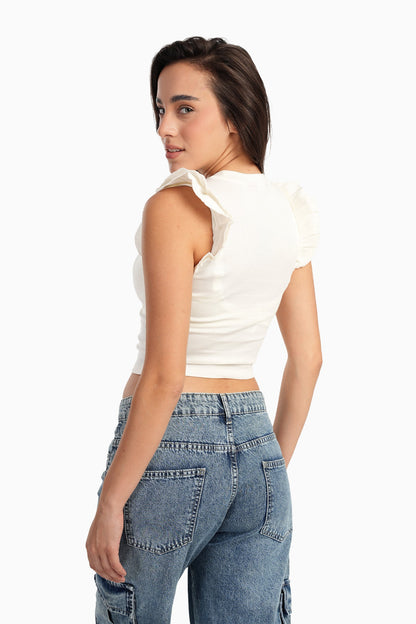 بلوزة بأكمام قصيرة مكشكشة باللون الأبيض العاجي