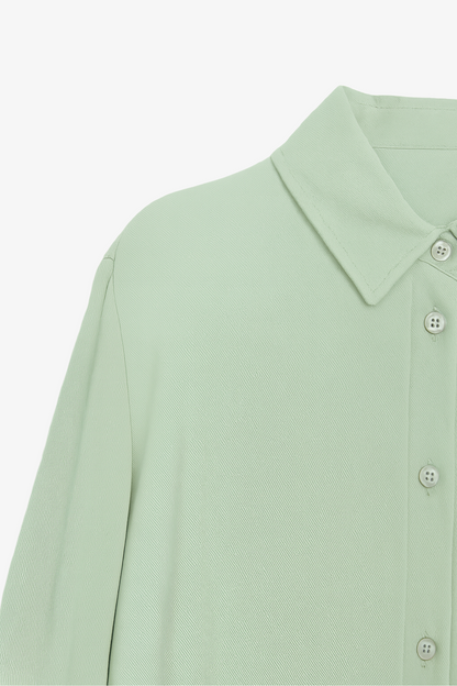 قميص أساسي ذو حافة مستديرة