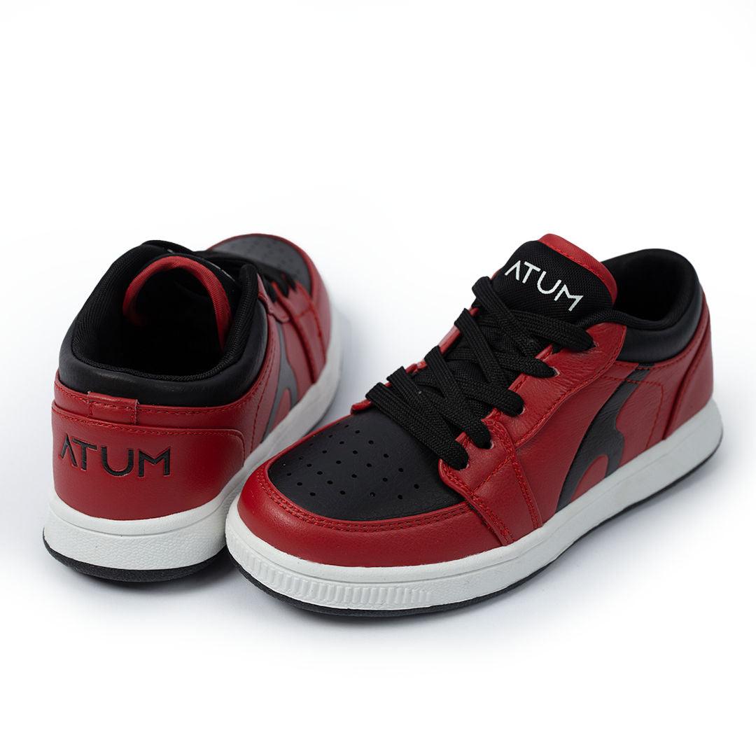 Photo by 𝗔𝗧𝗨ð�— SPORTSWEAR ® on December 26, 2022. May be of red/black lifestyle shoes with atum logo