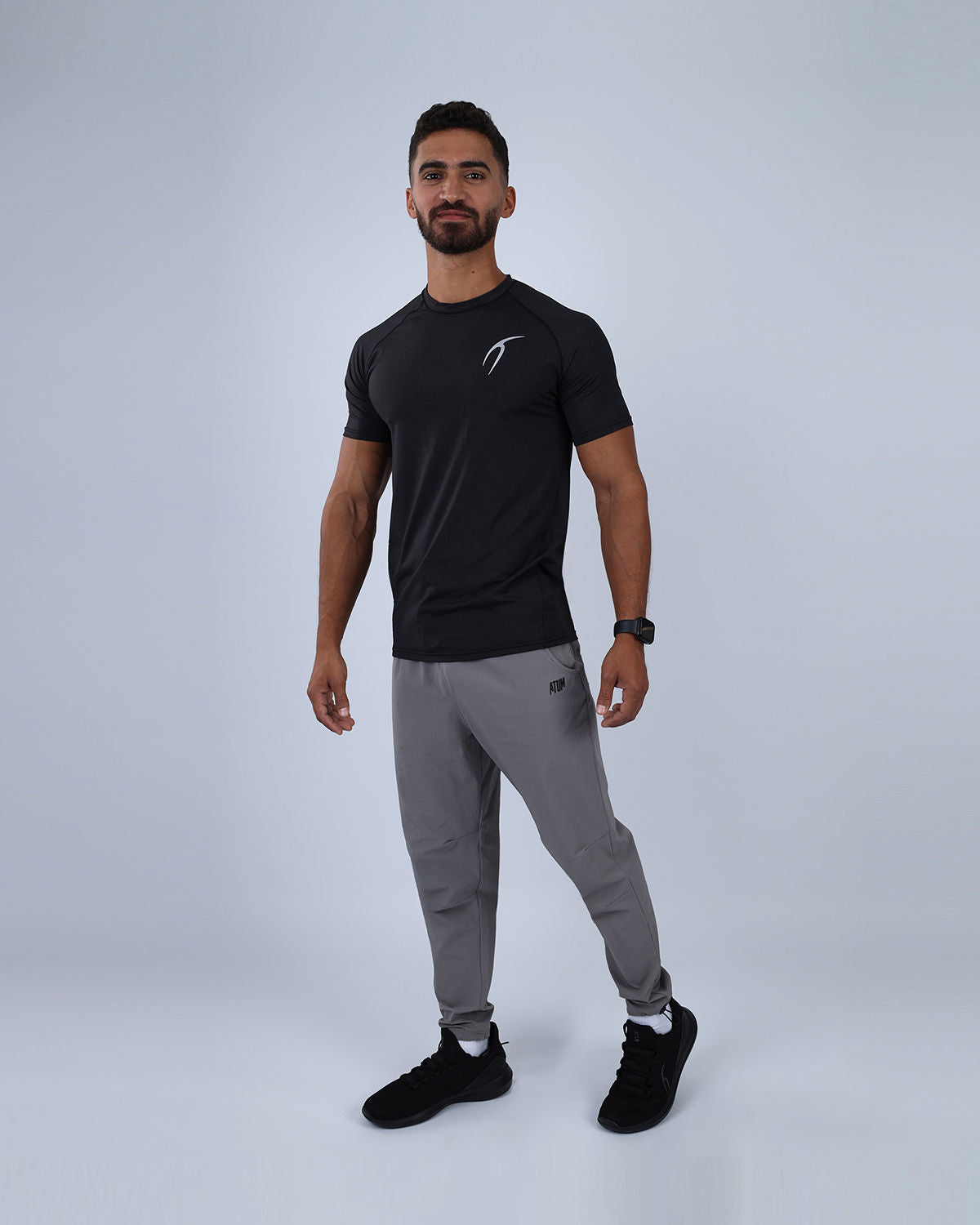 بلوزة رياضية قصيرة الأكمام من Dri-Fit باللون الأسود