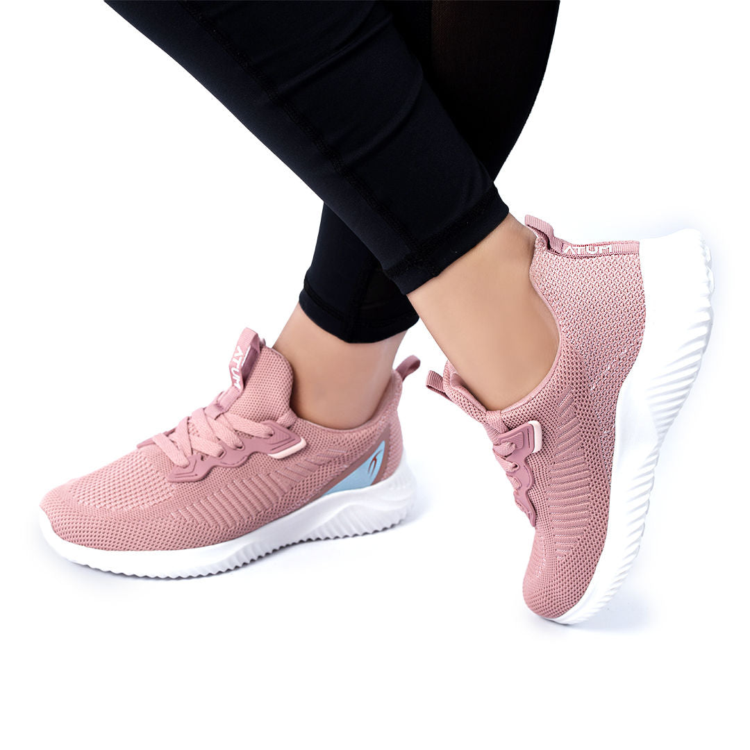 Photo by 𝗔𝗧𝗨ð�— SPORTSWEAR ® on December 26, 2022. May be a rose women's ultrafly training shoes with atum logo.