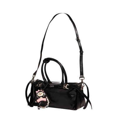 Elegant Leather Handbag with Medal