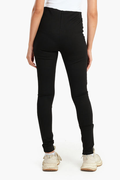 بنطال ضيق بفتحات سحاب