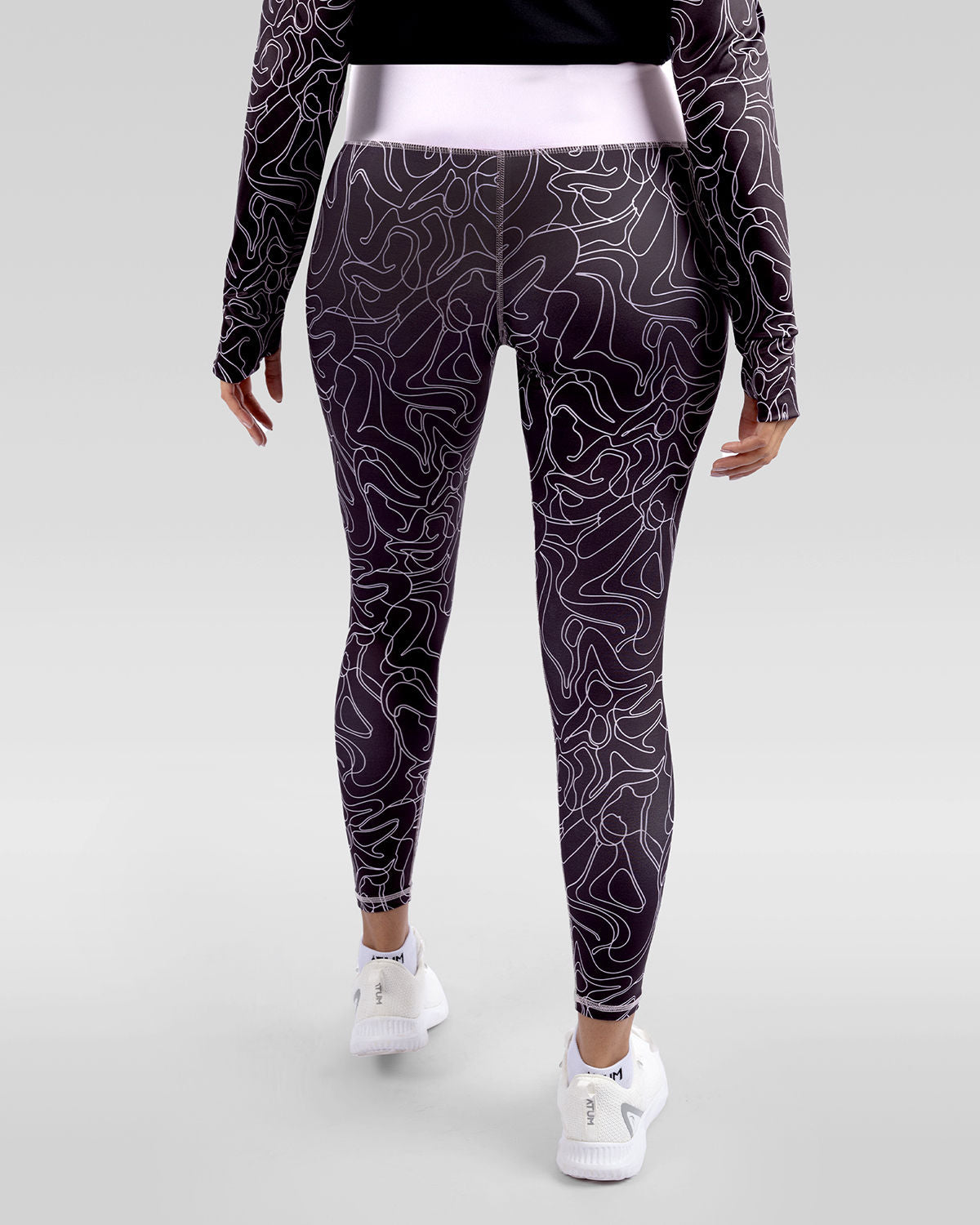 Photo by ð—”ð—§ð—¨ð— SPORTSWEAR Â® on December 20, 2022. May be an image of 1 woman wears rose printed leggings, and white shoes.