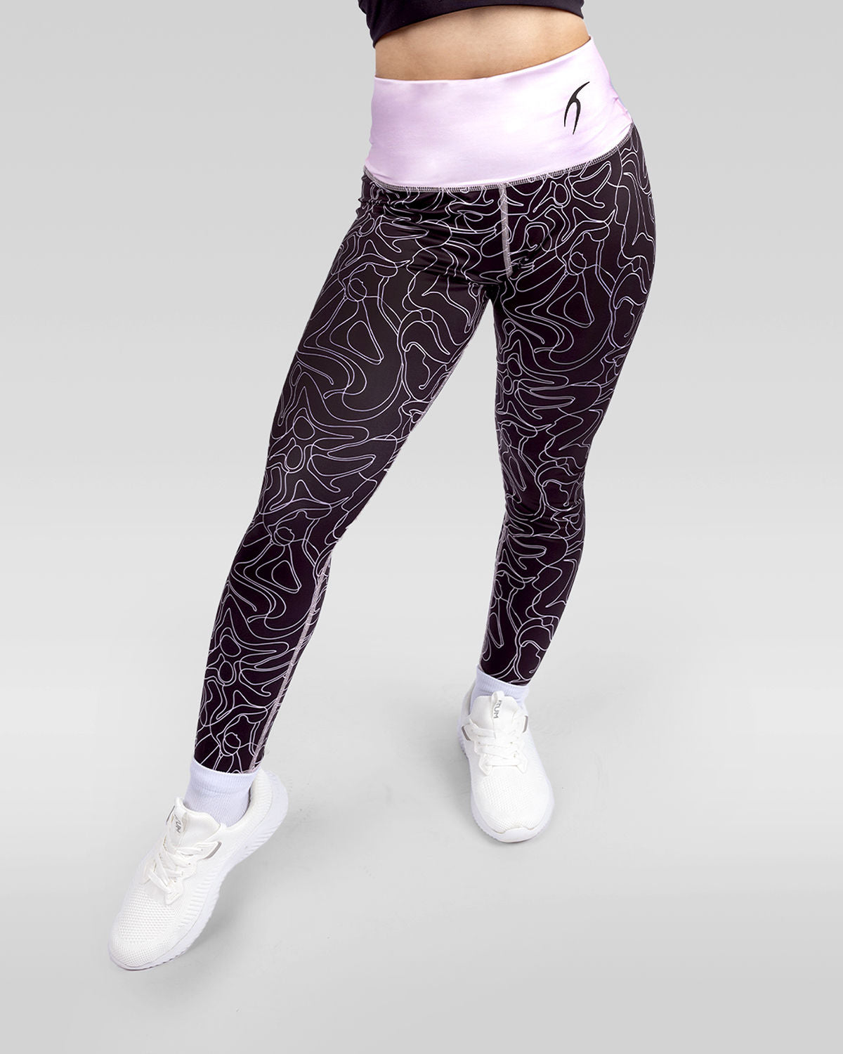 Photo by ð—”ð—§ð—¨ð— SPORTSWEAR Â® on December 20, 2022. May be an image of 1 woman wears rose printed leggings, and white shoes.