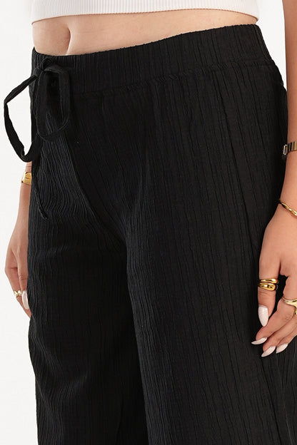 بنطلون كتان بنقش ذاتي