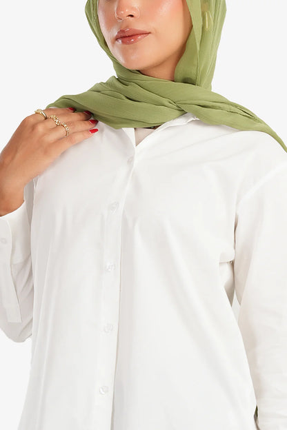 قميص بأكمام طويلة غير متماثلة