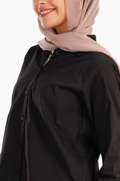 قميص بأكمام طويلة غير متماثلة