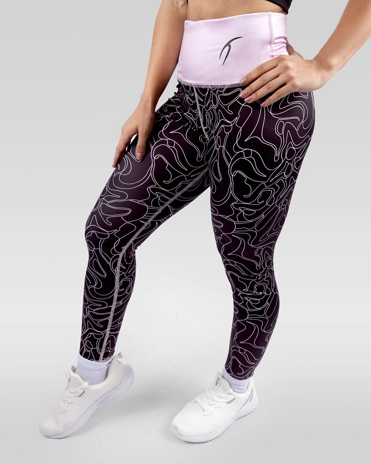 Photo by ð—”ð—§ð—¨ð— SPORTSWEAR Â® on December 20, 2022. May be an image of 1 woman wears rose printed leggings, and white shoes.