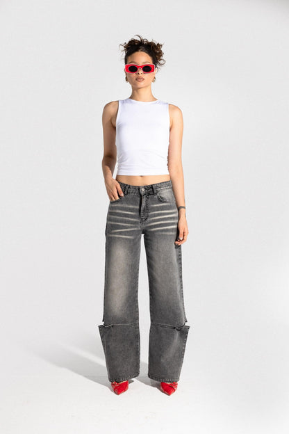 بنطال جينز رمادي بساق واسعة وفتحة منخفضة